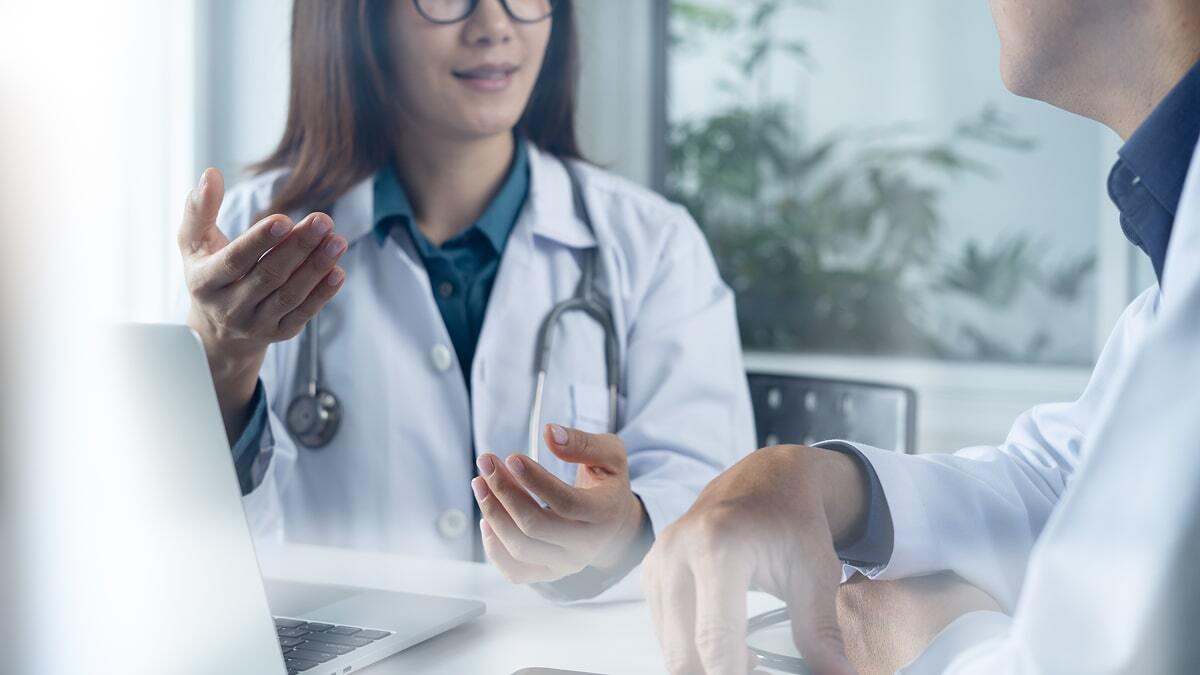 Physicians with a laptop