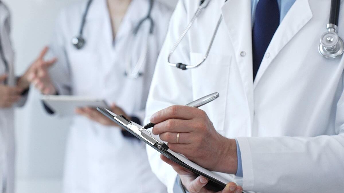 Physician with clipboard