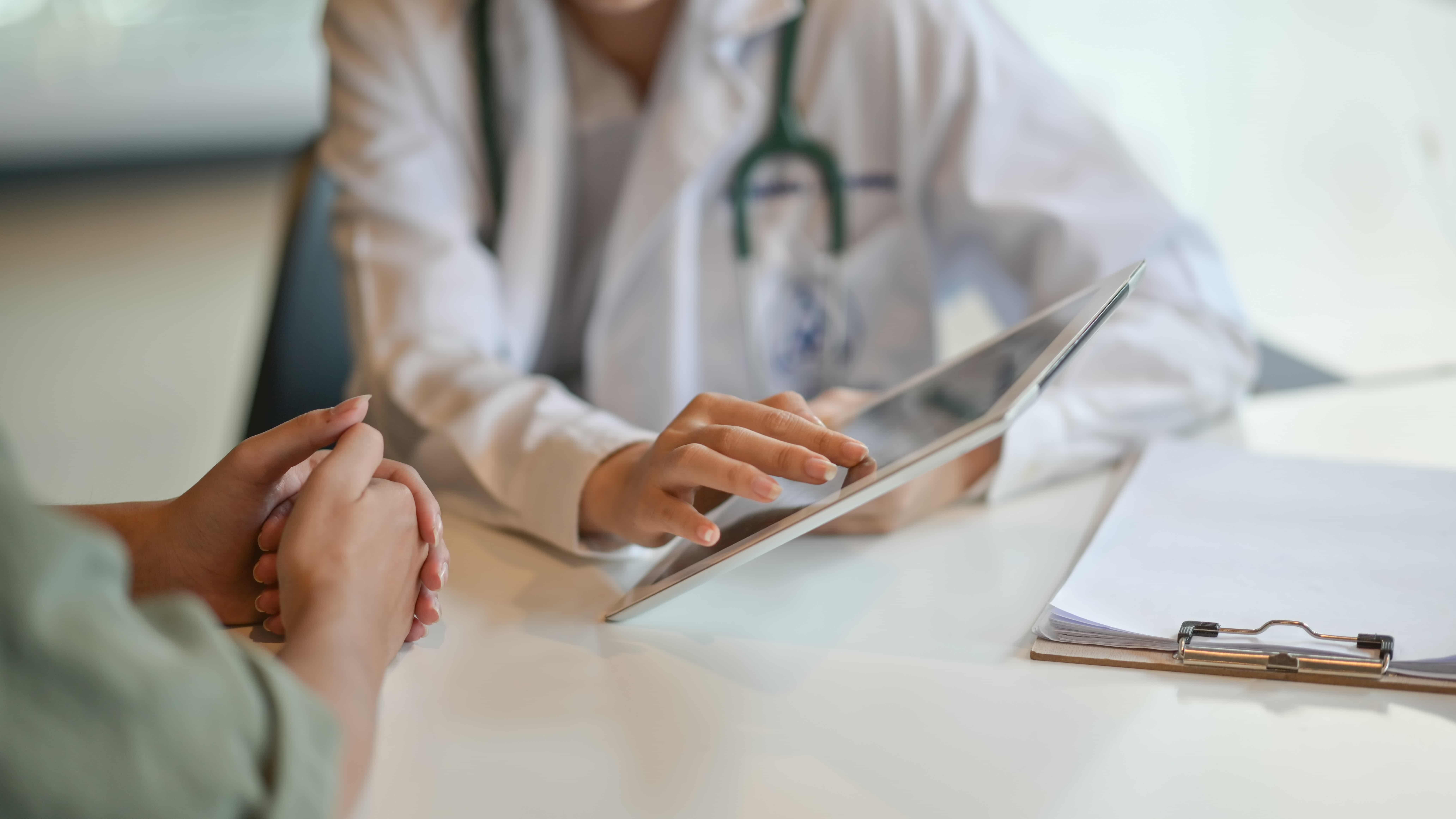 Physician with tablet