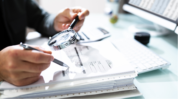 Audit with a magnifying glass