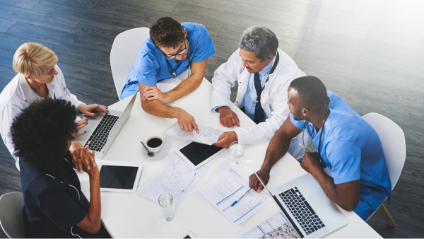 Physicians around a table