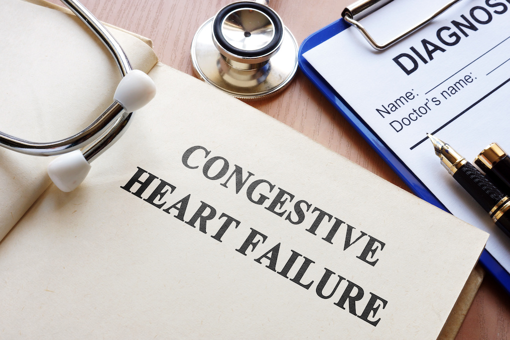 Image of physician's desk with a folder titled congestive heart failure